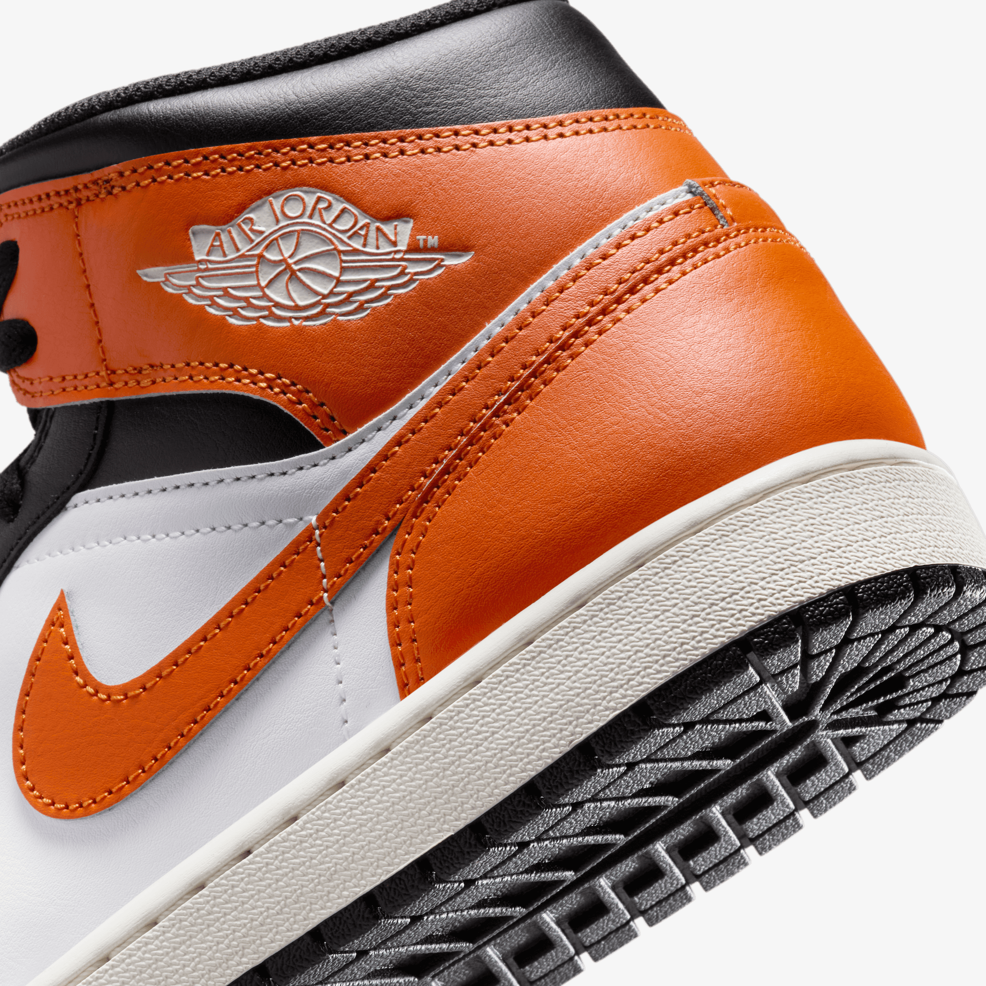 Nike Air Jordan 1 Mid – Black / Starfish / White / Sail